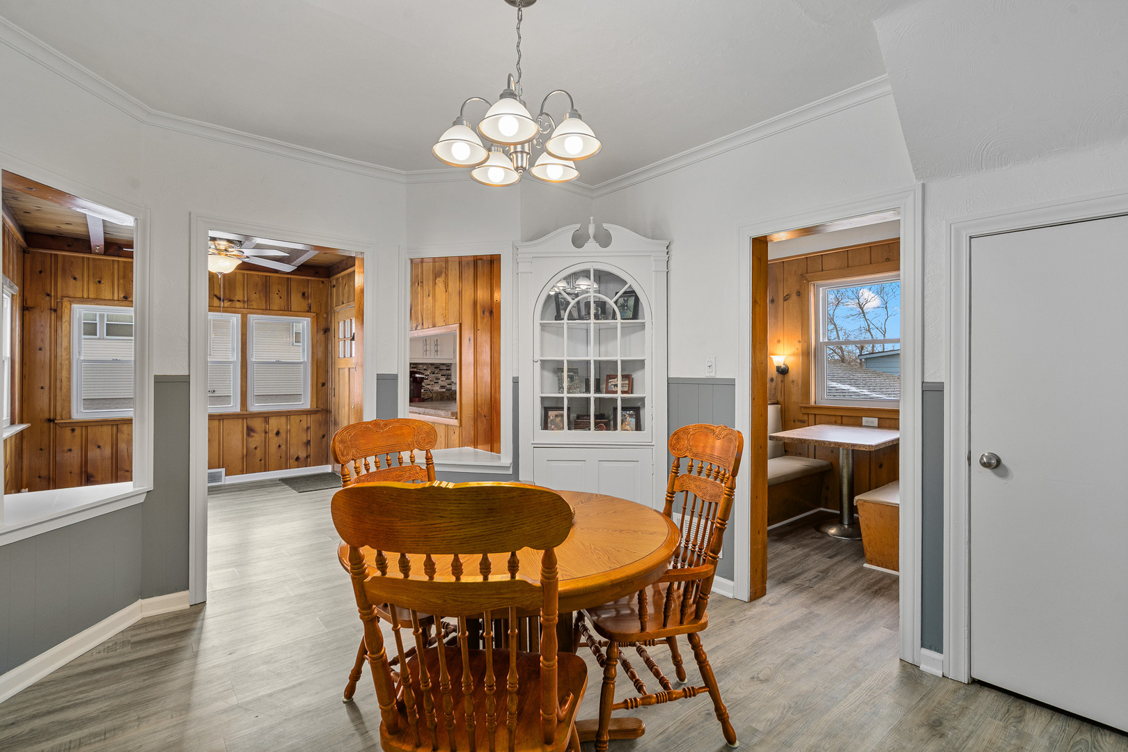 501 South Hamilton Street Lockport, IL 60441 - Photo 15 of 45 a dining room with furniture a chandelier and wooden floor