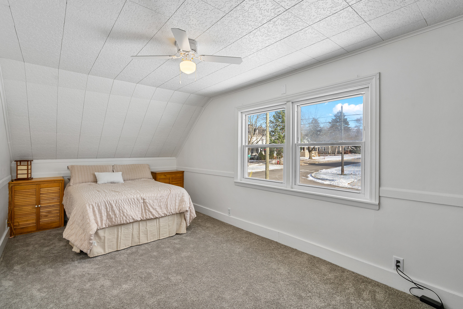 501 South Hamilton Street Lockport, IL 60441 - Photo 26 of 45 a bedroom with a bed lamp and window