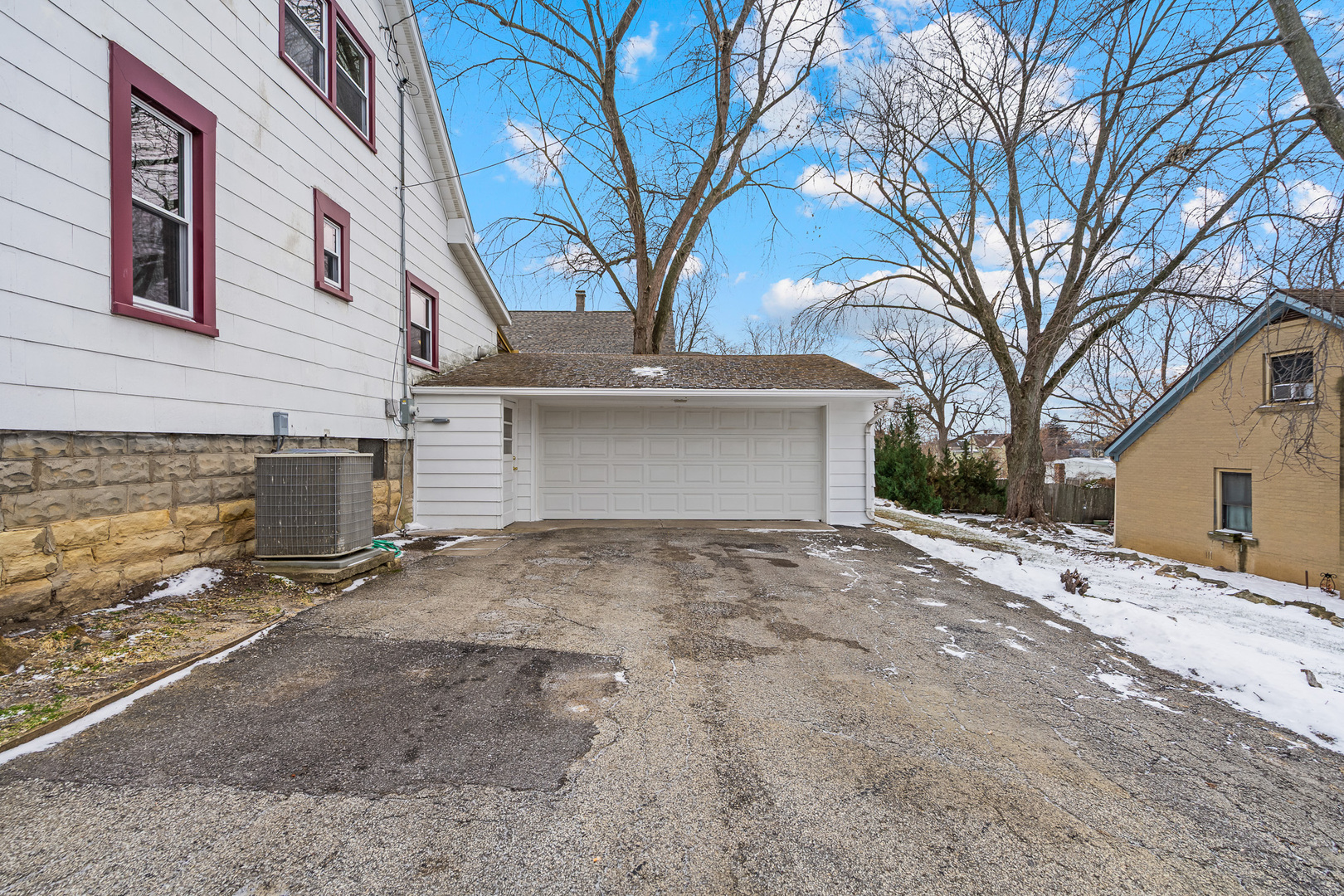 501 South Hamilton Street Lockport, IL 60441 - Photo 37 of 45 a front view of a house with a yard and garage