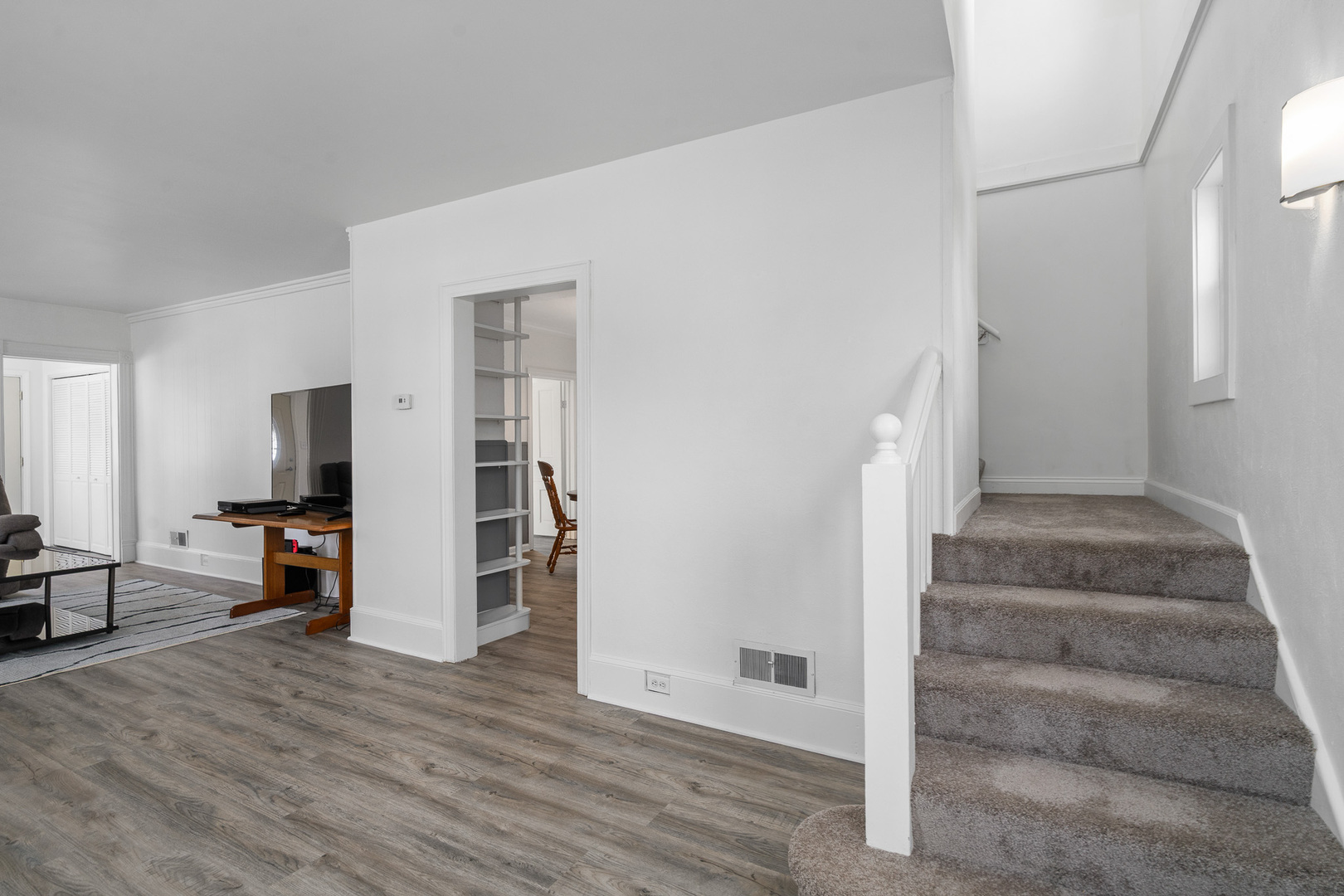 501 South Hamilton Street Lockport, IL 60441 - Photo 9 of 45 a view of a livingroom with wooden floor and furniture