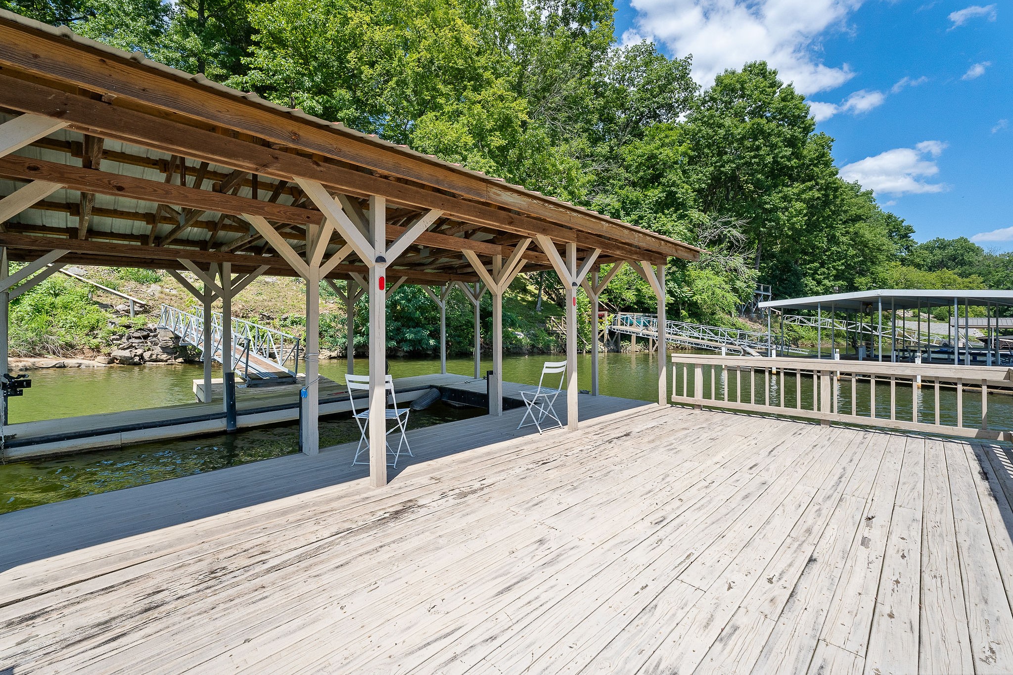 142 Rayahs Way Quebeck, TN 38579 - Photo 43 of 73 a view of a wooden deck with a yard