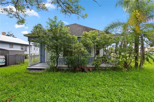 a view of a house with a garden