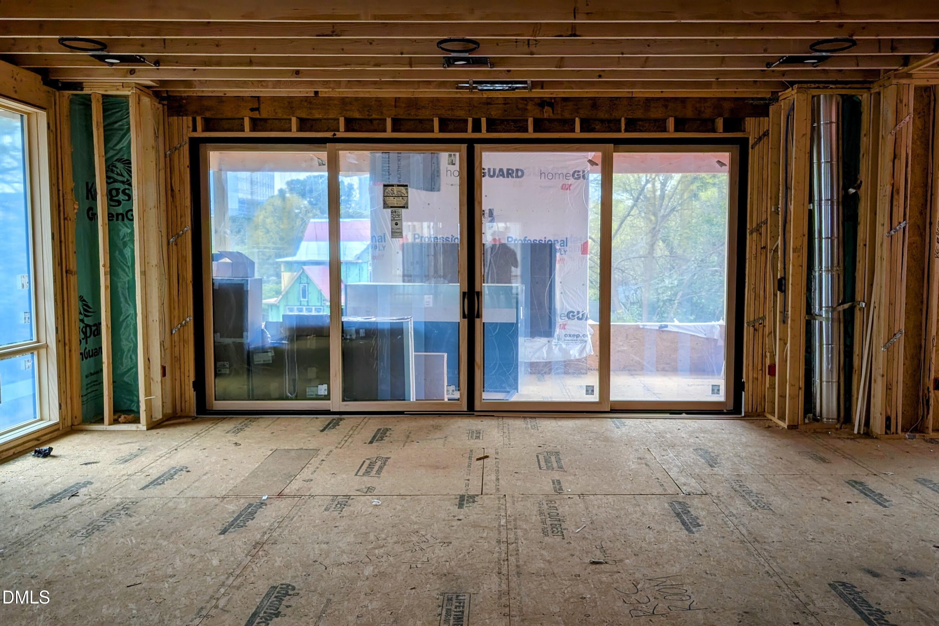 206 Lynwood Lane Raleigh, NC 27609 - Photo 13 of 33 a view of a room with large windows