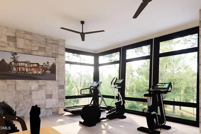 a front view of a multi story building with retail shops