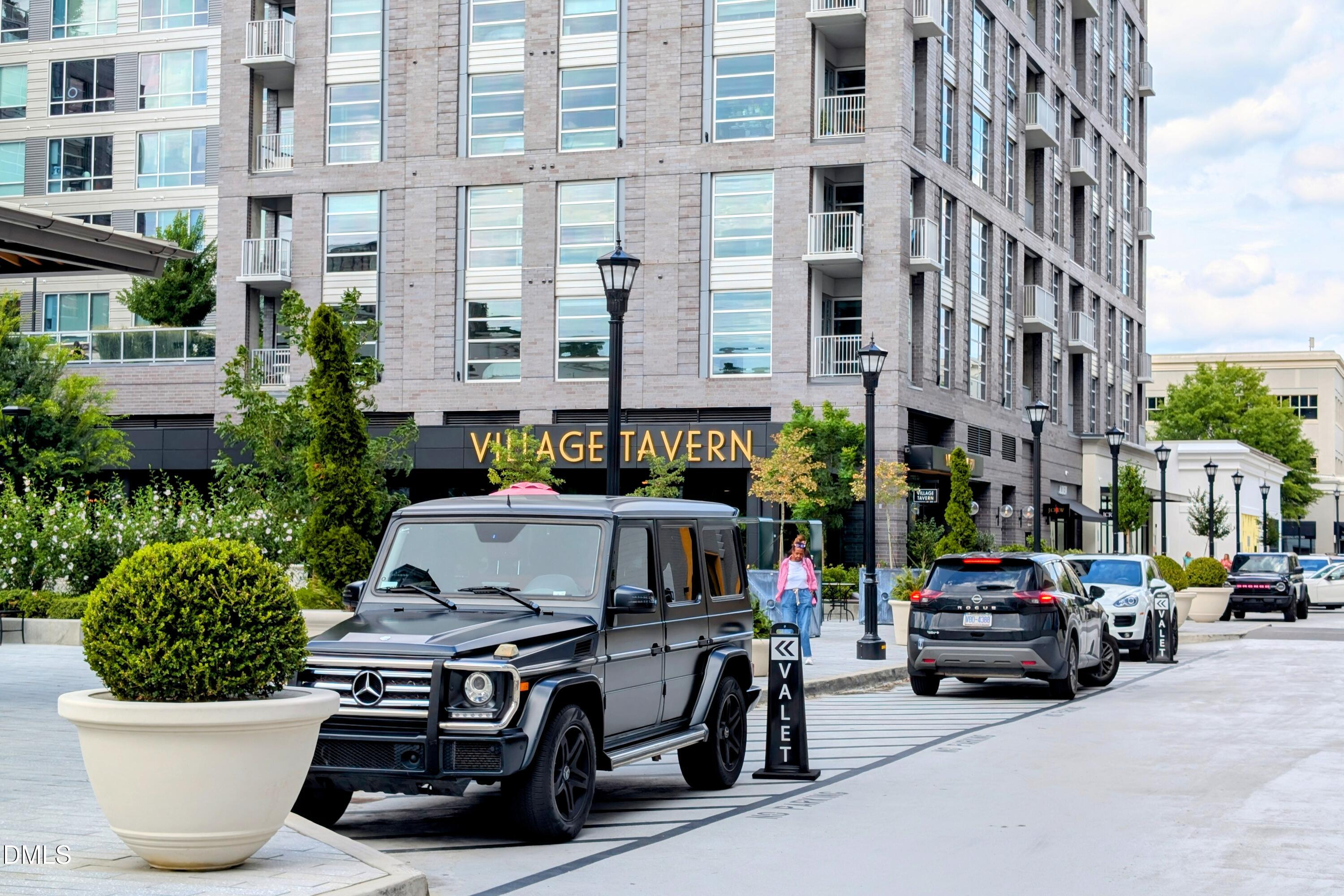 206 Lynwood Lane Raleigh, NC 27609 - Photo 32 of 37 a car parked in front of a building