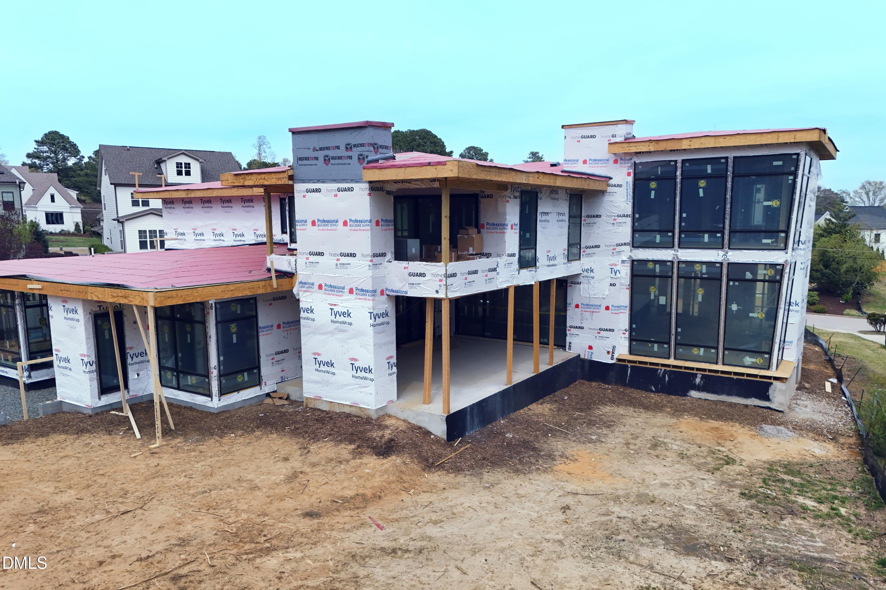 206 Lynwood Lane Raleigh, NC 27609 - Photo 6 of 33 a front view of a house with glass windows
