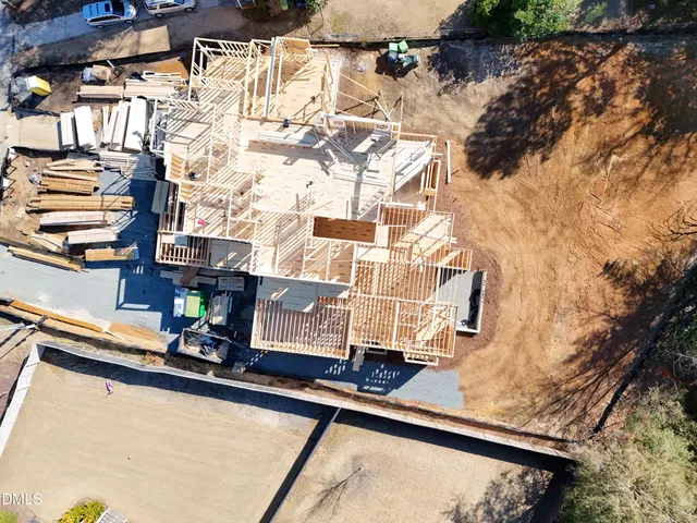 an outdoor view of garden with deck having patio