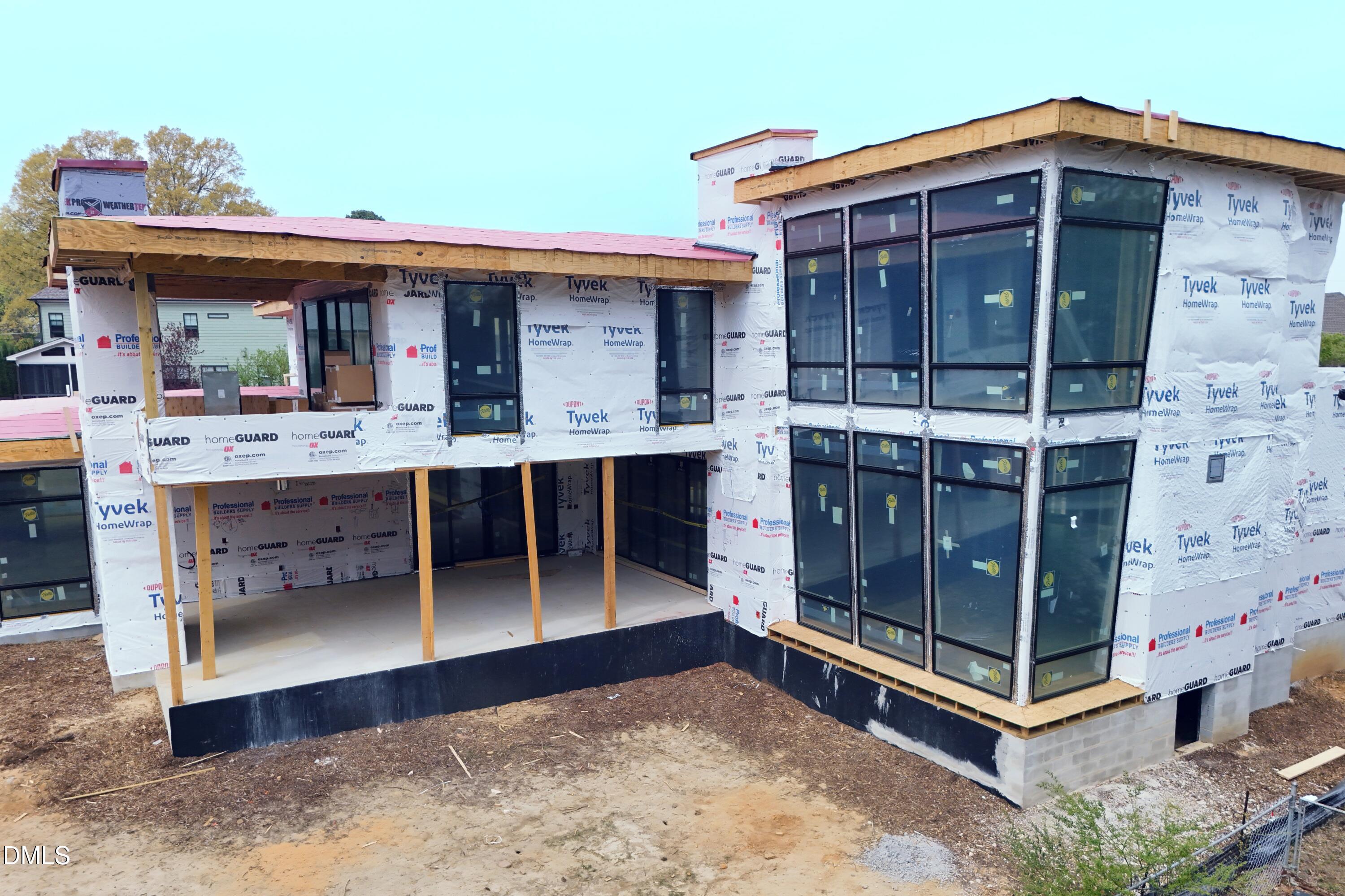 206 Lynwood Lane Raleigh, NC 27609 - Photo 9 of 33 a view of a room with a table and chairs