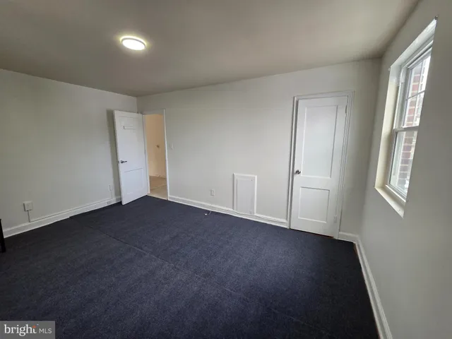 a view of empty room with window