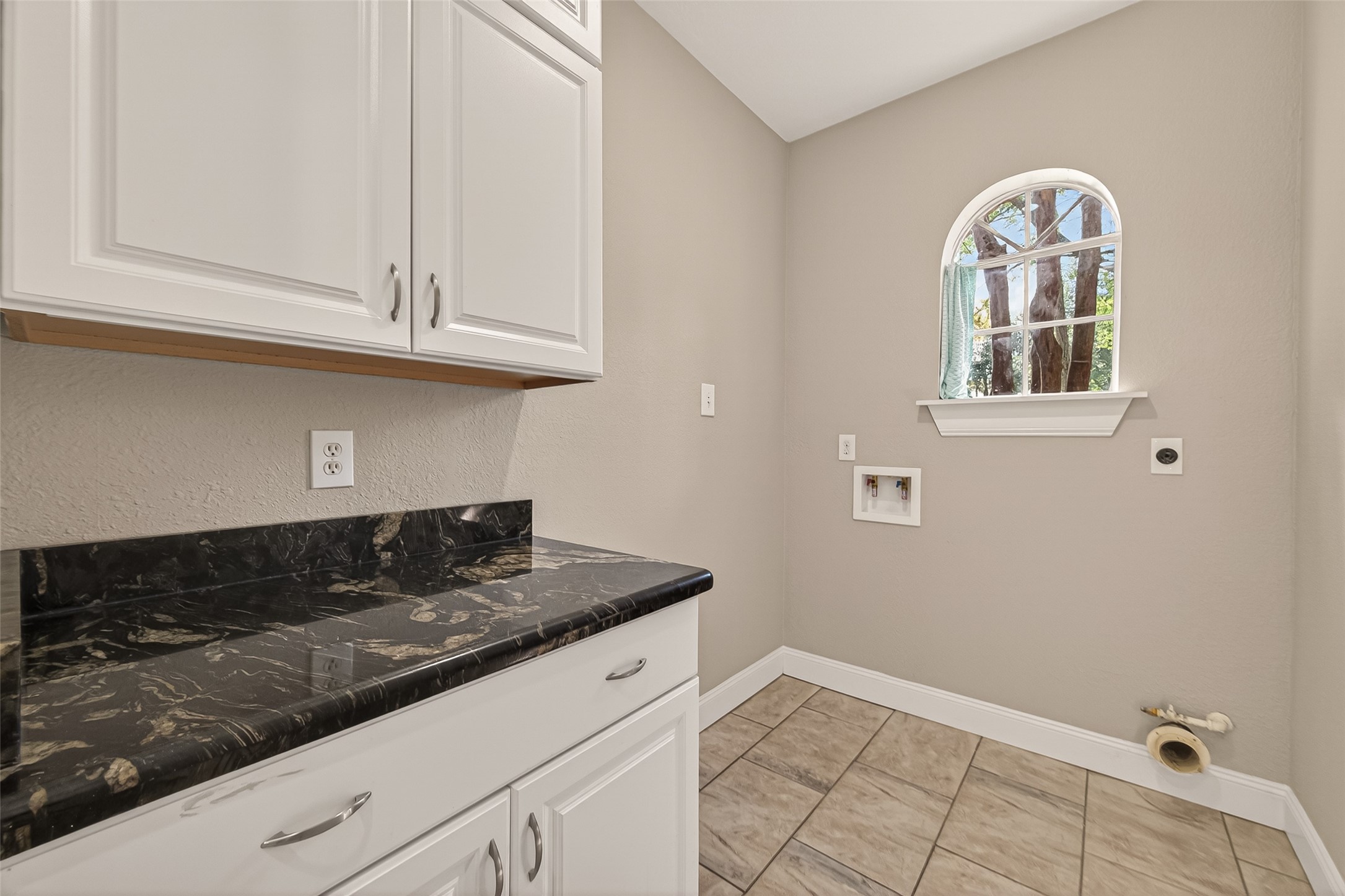 6131 Hampton Way Court Spring, TX 77389 - Photo 23 of 50 a kitchen with granite countertop white cabinets and stainless steel appliances