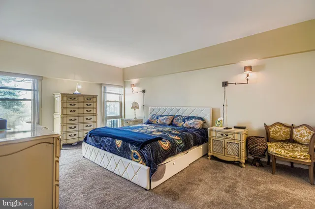 a bed room with a bed and a couch