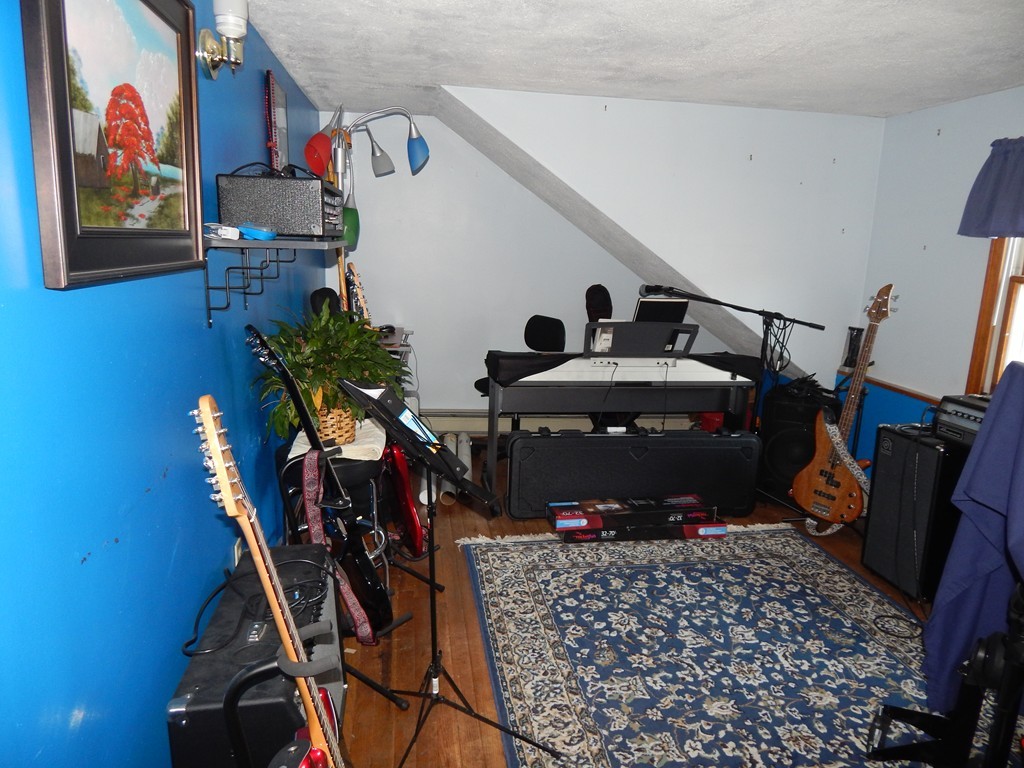 274 Athens Street Boston, MA 02127 - Photo 20 of 23 a very nice looking room with many windows