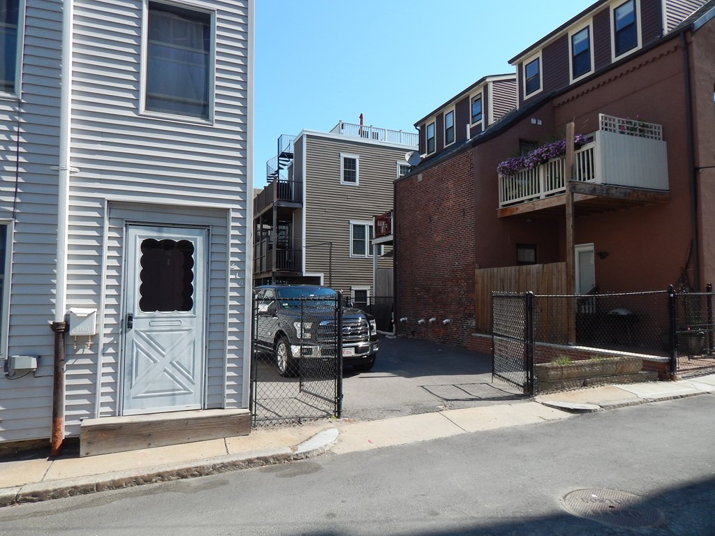 274 Athens Street Boston, MA 02127 - Photo 2 of 23 a front view of a building with street