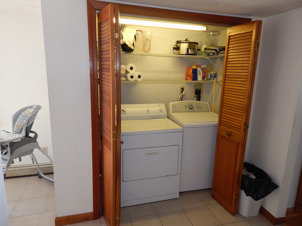 274 Athens Street Boston, MA 02127 - Photo 22 of 23 a bathroom with a sink a toilet and shower