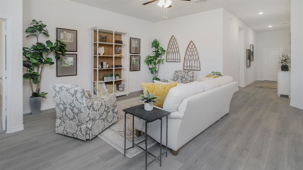 503 Range Road Caddo Mills, TX 75135 - Photo 15 of 19 Living area featuring a ceiling fan, light wood-style floors, and recessed lighting
