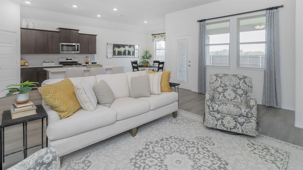 503 Range Road Caddo Mills, TX 75135 - Photo 16 of 19 Living room with recessed lighting and wood finished floors