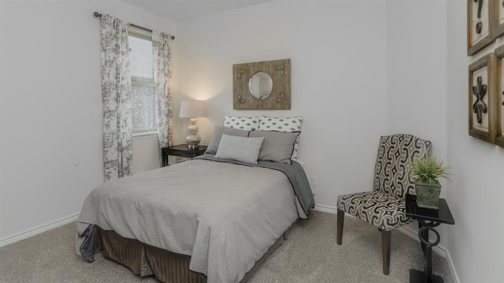503 Range Road Caddo Mills, TX 75135 - Photo 3 of 19 Bedroom with light carpet