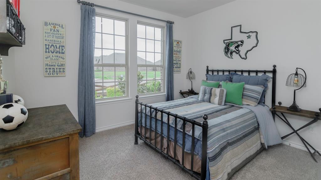 503 Range Road Caddo Mills, TX 75135 - Photo 4 of 19 Bedroom with light carpet