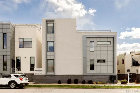 a car parked in front of a building