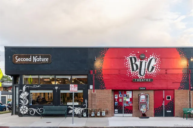 a car parked in front of a building