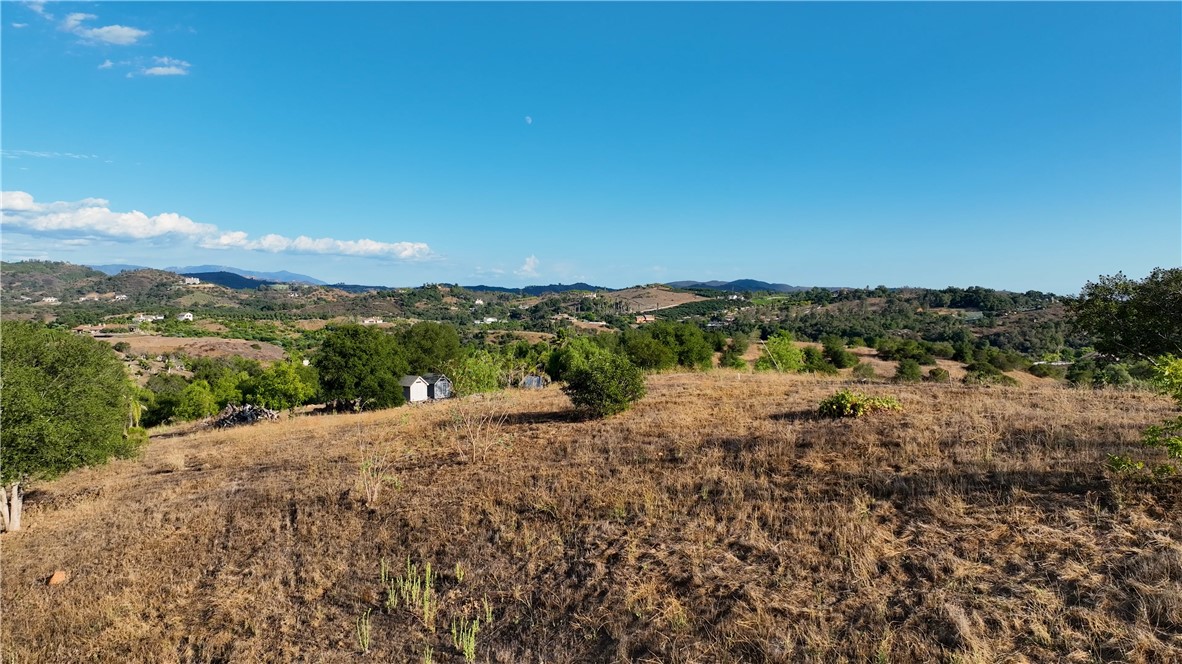 22735 Carancho Road Temecula, CA 92590 - Photo 9 of 17 a view of a road with mountains in the background