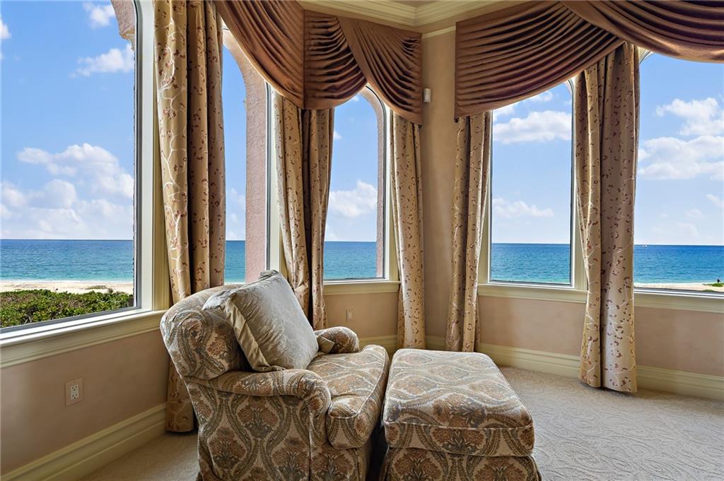 1025 Northeast Doubloon Drive Stuart, FL 34996 - Photo 14 of 69 a bedroom with a bed and a window