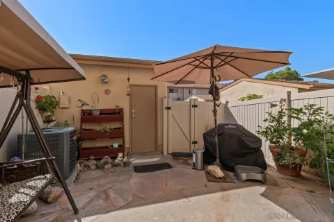 a view of a car park in front of a house
