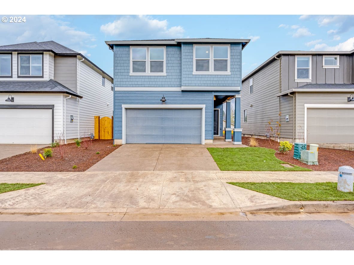 2604 26th Loop Springfield, OR 97477 - Photo 1 of 12 a view of a yard in front view of a house