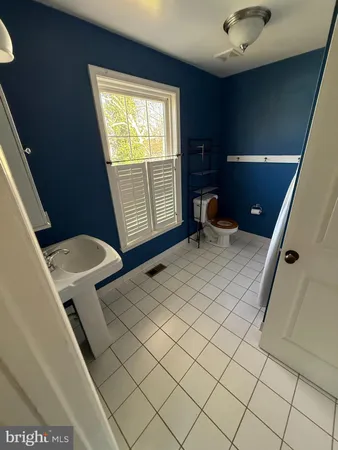 a room with furniture and window