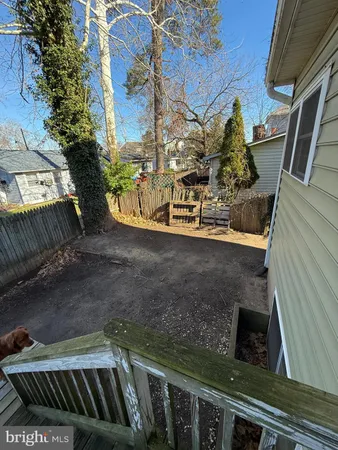 a view of balcony with wooden floor