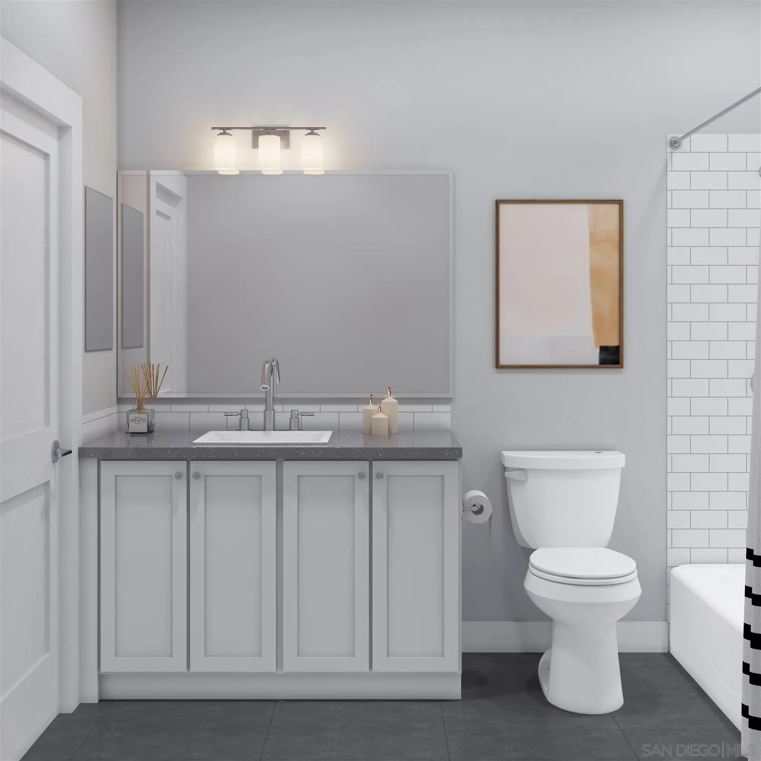 345 Oak Avenue Carlsbad, CA 92008 - Photo 17 of 21 a bathroom with a toilet a sink and mirror