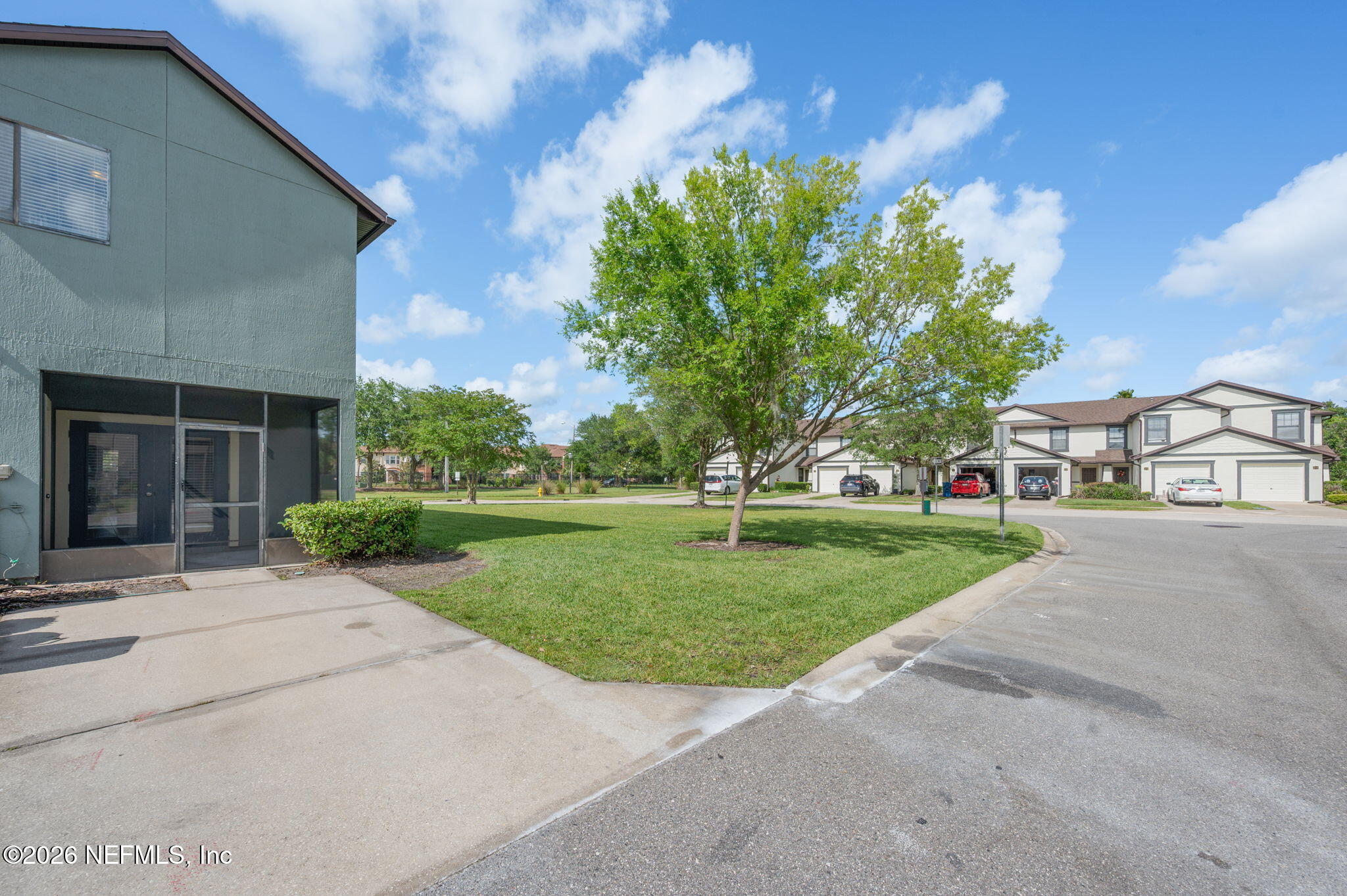 253 Syrah Way St. Augustine, FL 32084 - Photo 35 of 39 a view of a street with a house in the background
