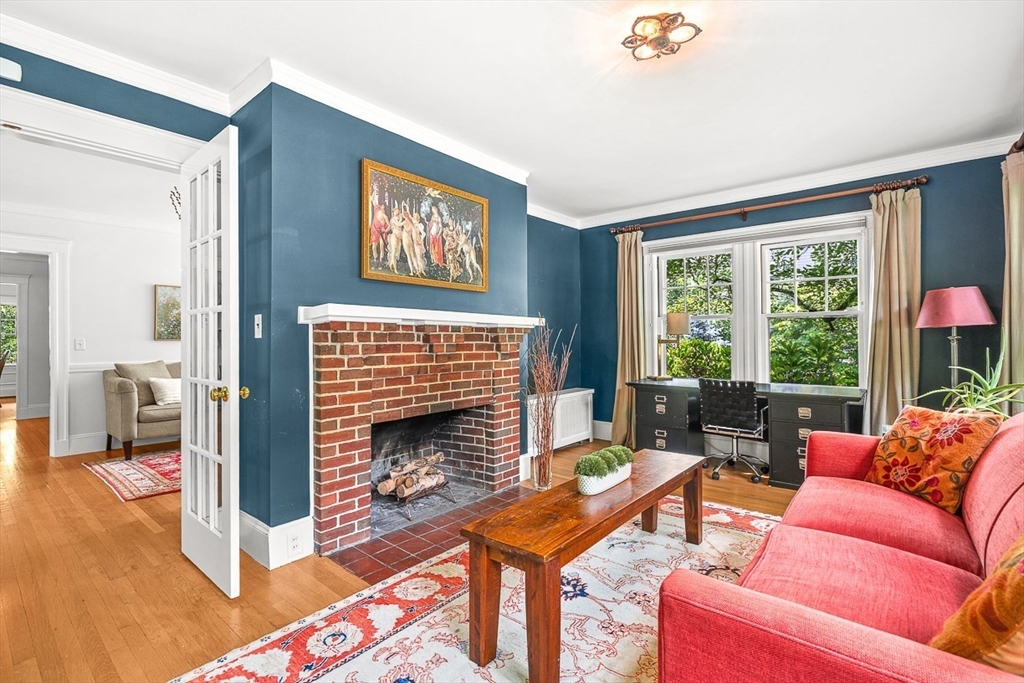 34 Rangeley Road Winchester, MA 01890 - Photo 11 of 42 a living room with furniture fireplace and a large window