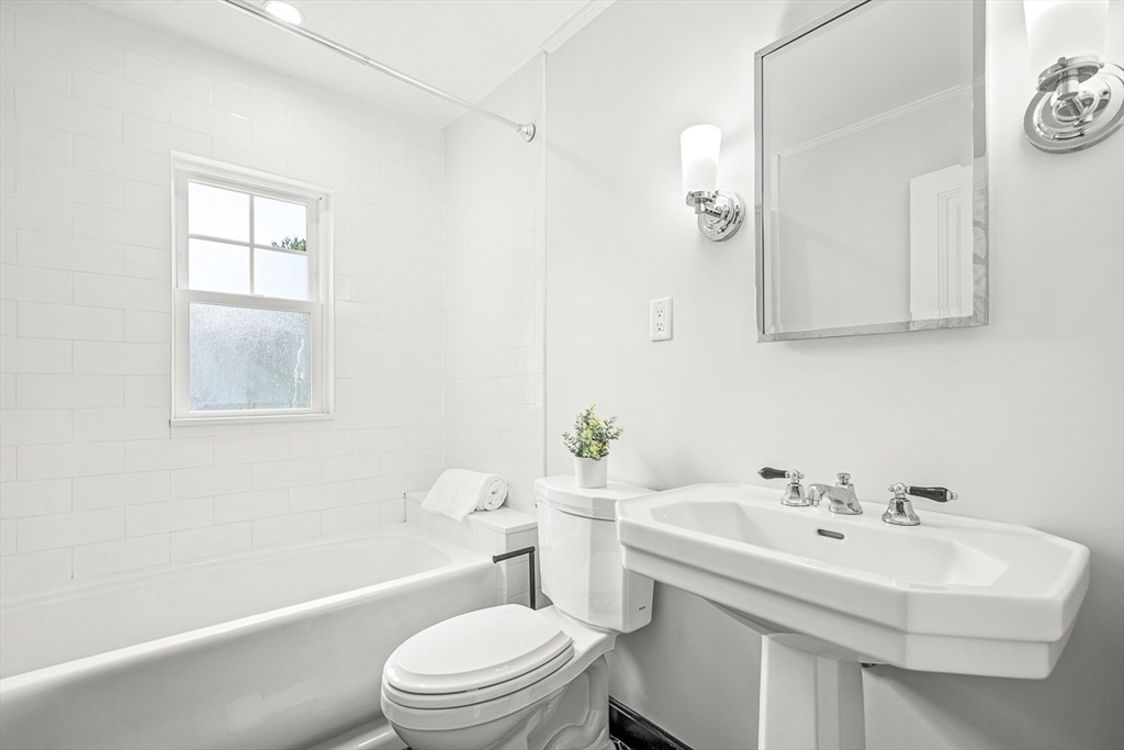 34 Rangeley Road Winchester, MA 01890 - Photo 28 of 42 a bathroom with a sink toilet and shower