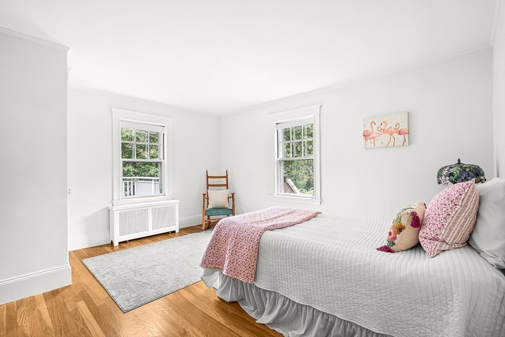 34 Rangeley Road Winchester, MA 01890 - Photo 29 of 42 a bedroom with a bed and wooden floor