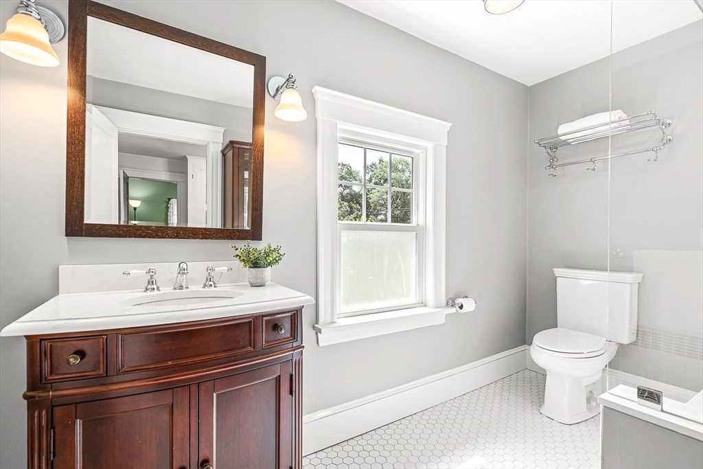 34 Rangeley Road Winchester, MA 01890 - Photo 31 of 42 a bathroom with a sink toilet and mirror