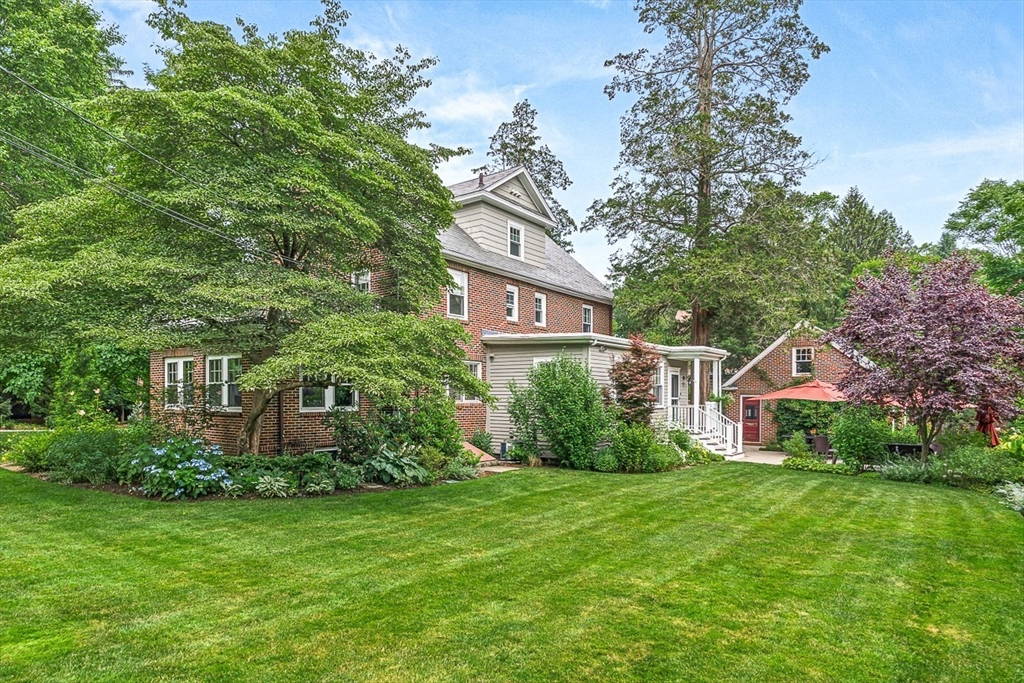 34 Rangeley Road Winchester, MA 01890 - Photo 38 of 42 a front view of house with yard and green space