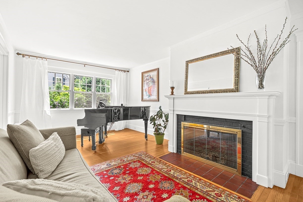 34 Rangeley Road Winchester, MA 01890 - Photo 7 of 42 a living room with furniture and a fireplace