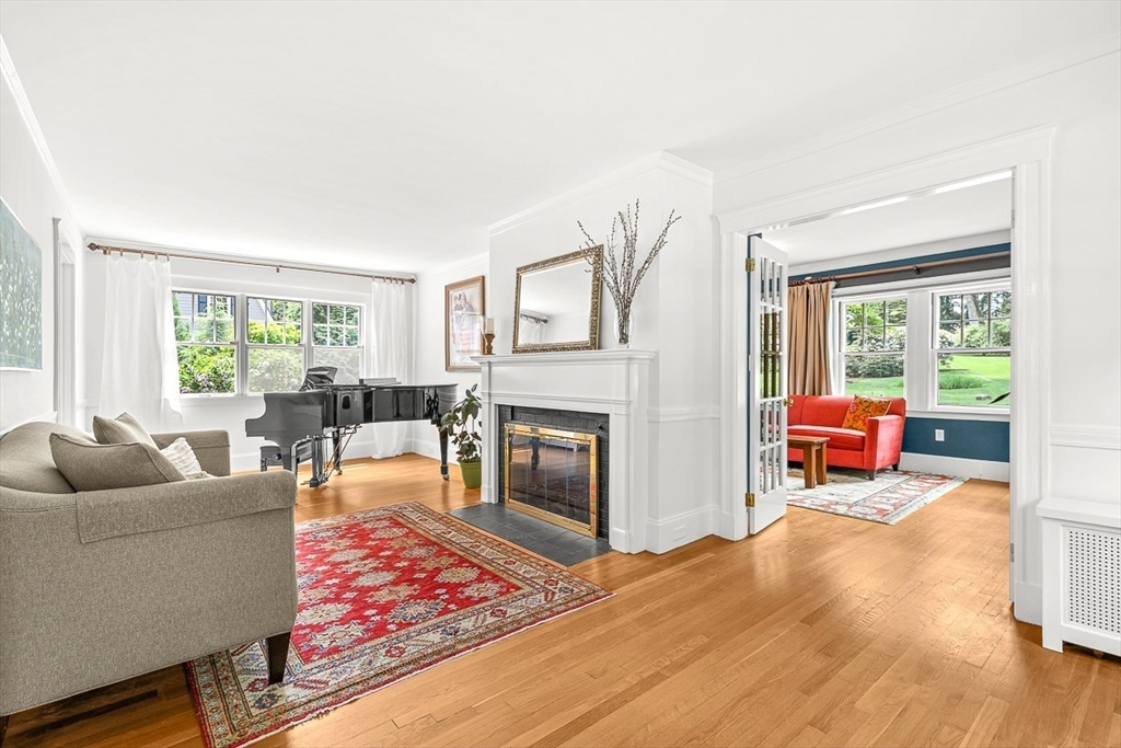 34 Rangeley Road Winchester, MA 01890 - Photo 8 of 42 a living room with furniture and a fireplace
