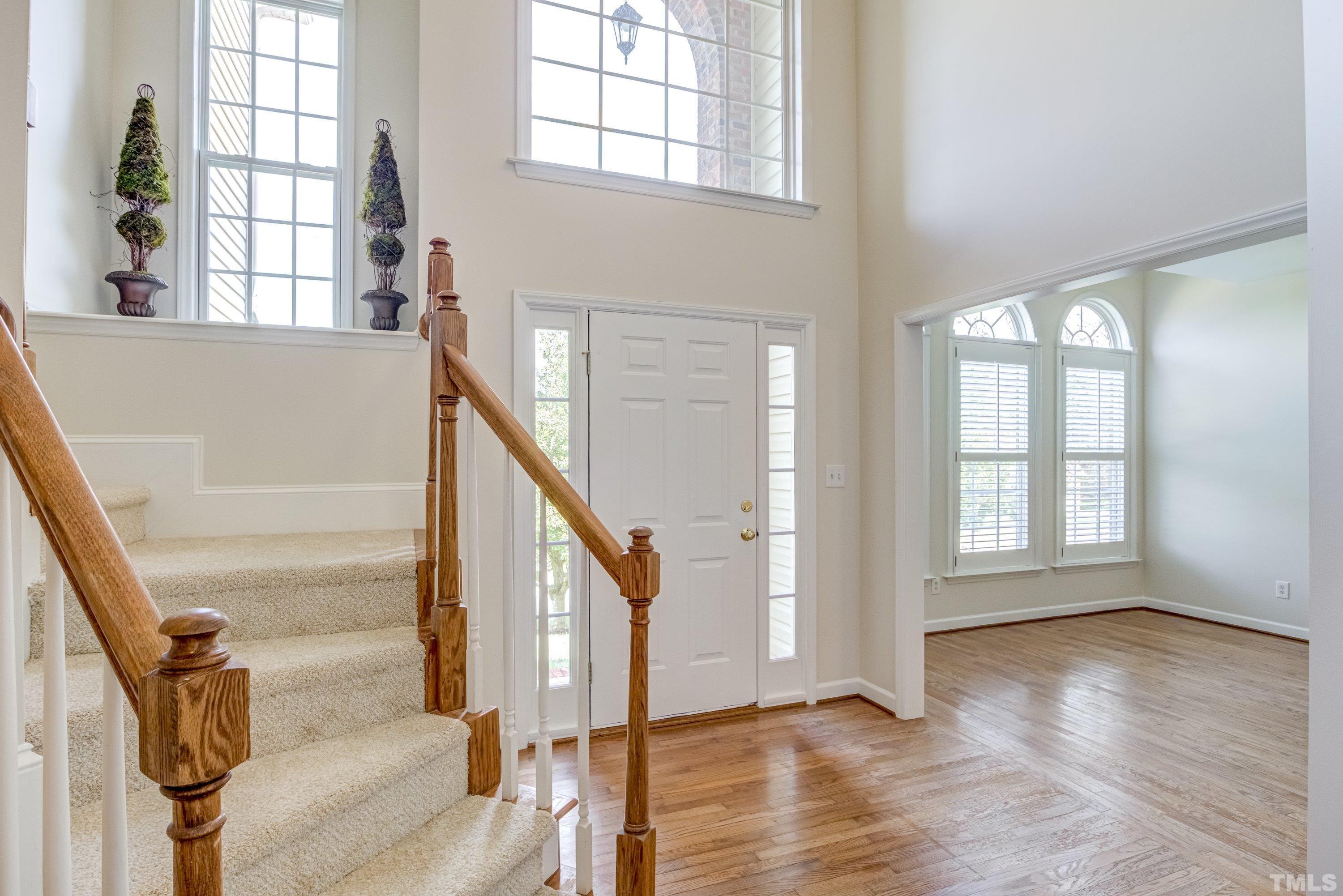467 Seastone Street Raleigh, NC 27603 - Photo 6 of 38 wooden floor and an entryway with wooden floor