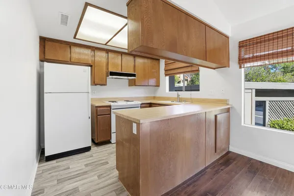 a utility room with washer and dryer