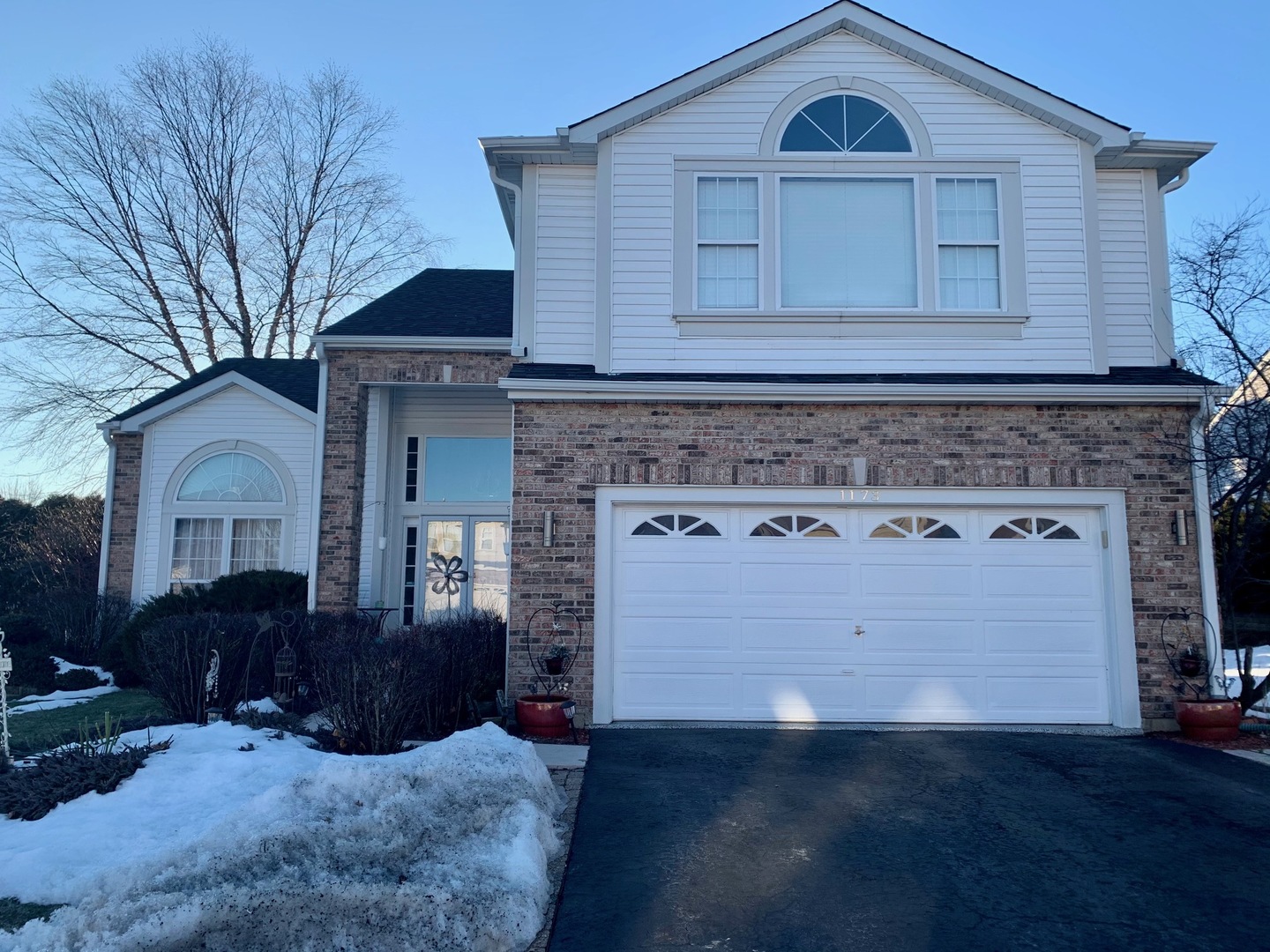 1173 Prides Run Lake In The Hills, IL 60156 - Photo 1 of 1 a front view of a house with a yard