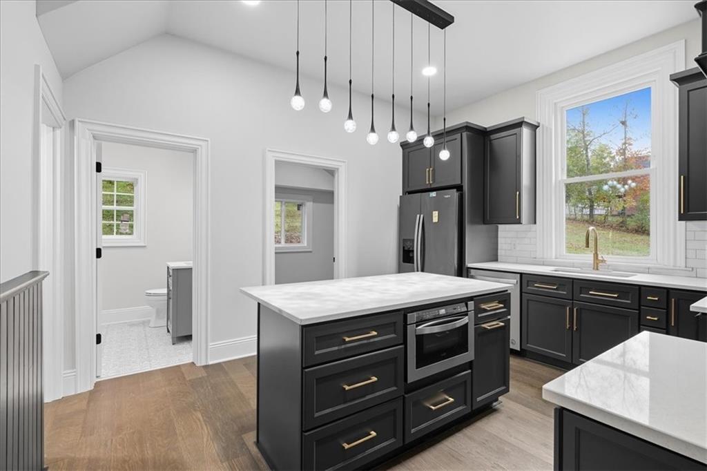 205 Spring Street Oakdale, PA 15071 - Photo 14 of 50 a kitchen with a counter space appliances and cabinets