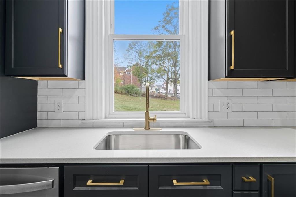 205 Spring Street Oakdale, PA 15071 - Photo 15 of 50 a kitchen with a sink and a window