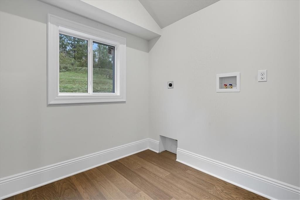 205 Spring Street Oakdale, PA 15071 - Photo 16 of 50 an empty room with wooden floor and windows