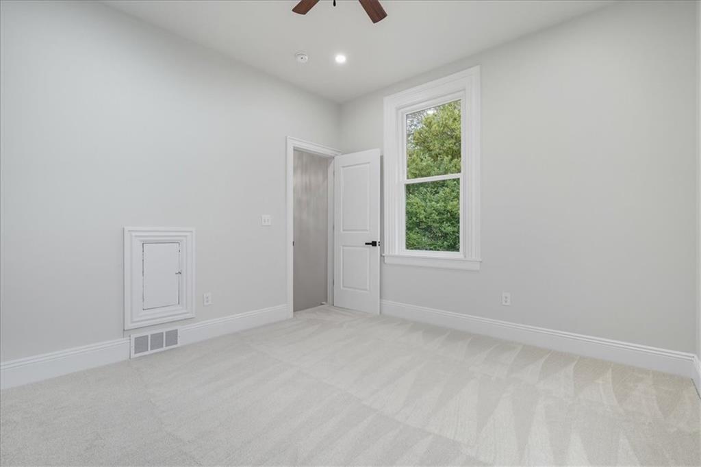205 Spring Street Oakdale, PA 15071 - Photo 32 of 50 an empty room with windows and closet