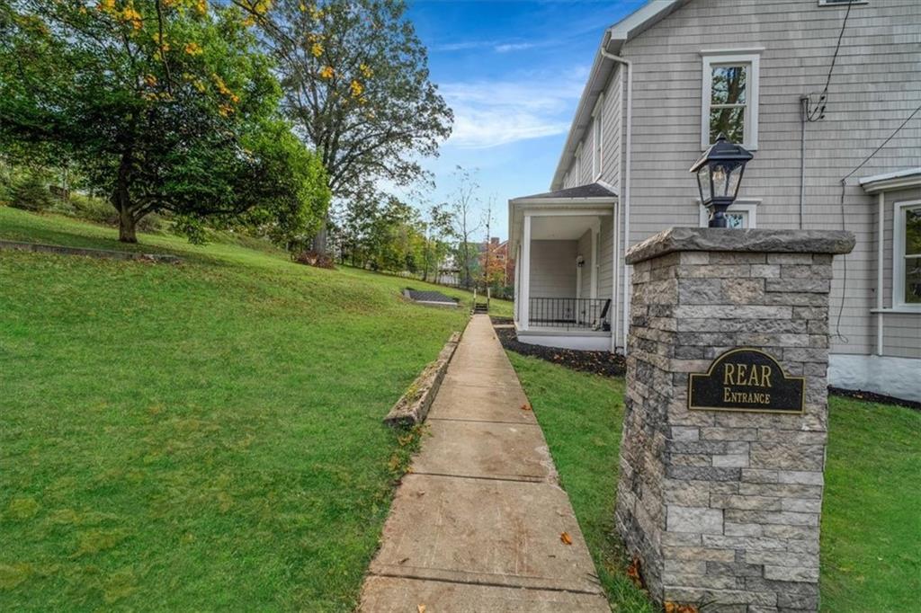 205 Spring Street Oakdale, PA 15071 - Photo 41 of 50 a front view of a house with garden