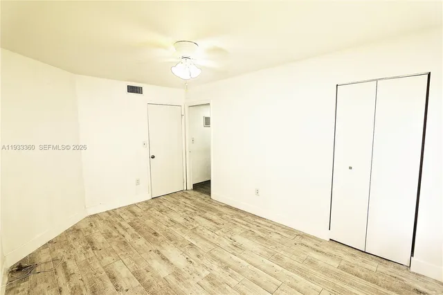 a view of a bathroom with an empty space