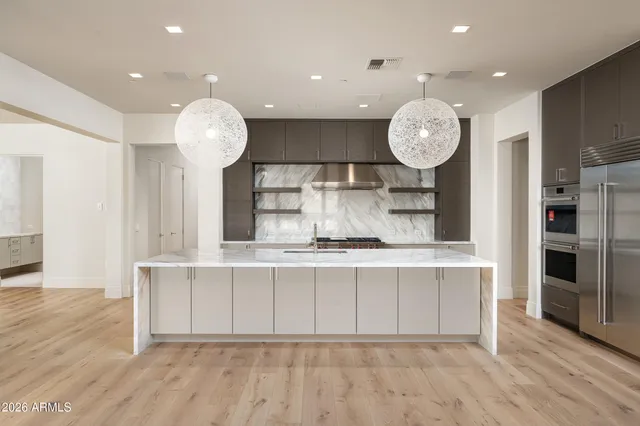 a view of a house with a garden