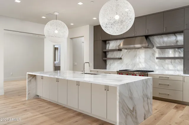 an aerial view of houses covered in trees